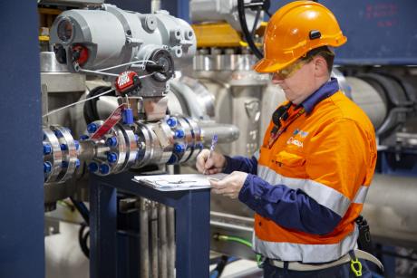 Gold Coast Desalination Plant  Operator-Maintainer Michael Rae inspecting equipment at the facility