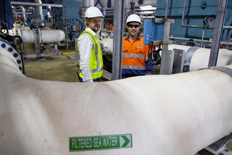 Gold Coast Desalination Plant Maintenance Planner Brian Woods and Project Engineer Daryl Harding pictured in the facility's pump room 