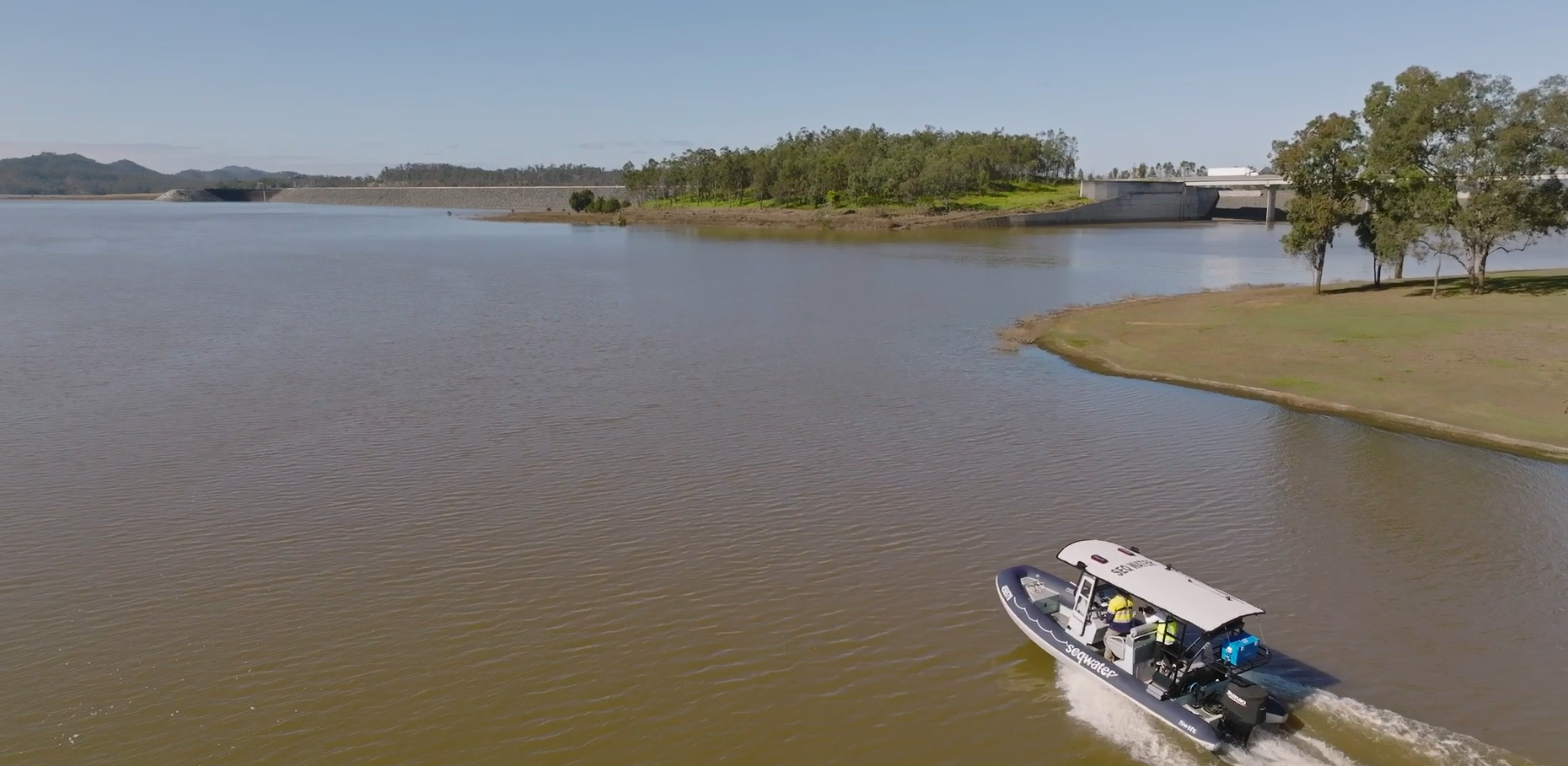 Seqwater boat patrolling dam