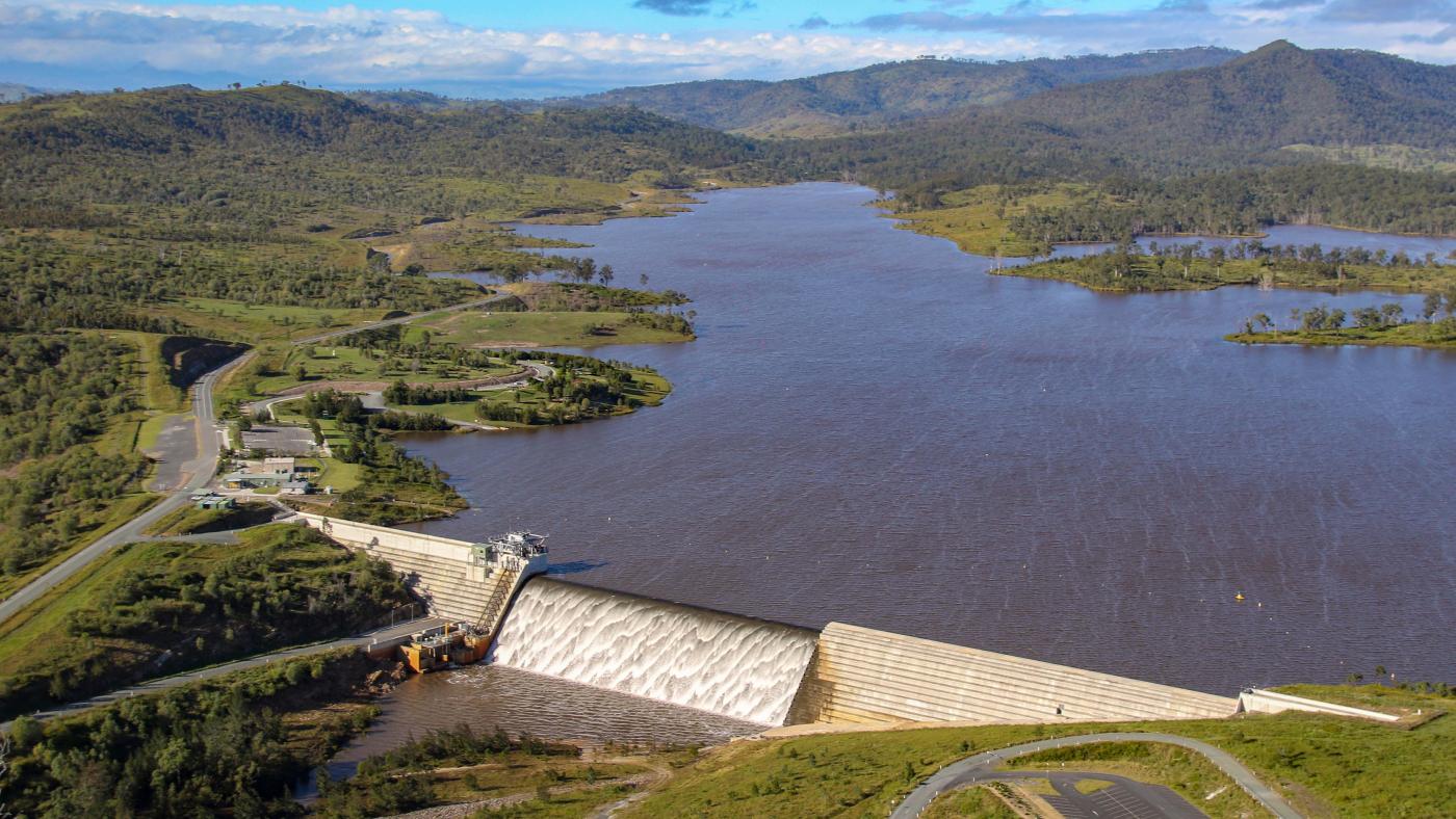 Aerial of Wyaralong Dam spilling