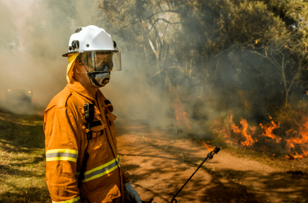 Seqwater Fire Officer conducting a planned burn. 